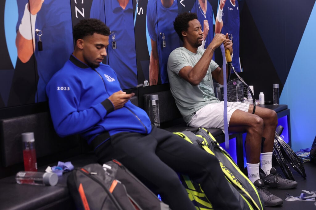 Arthur Fils and Gael Monfils sit beside one another