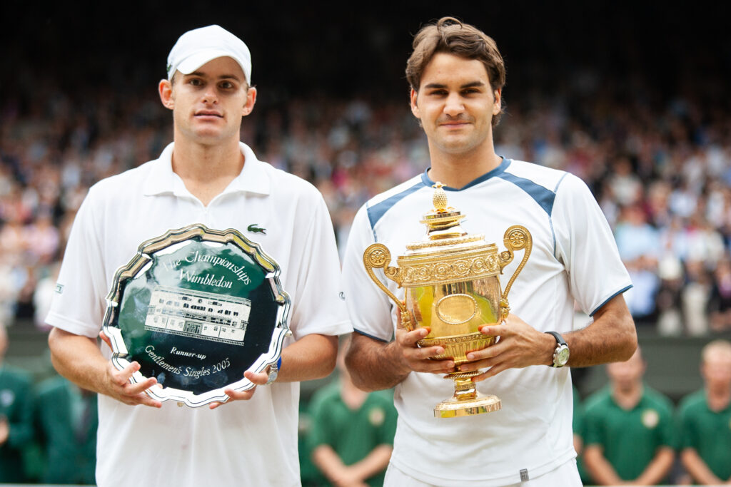 Roger Federer of Switzerland and Andy Roddick of USA hold their trophies after the Men's Single Final against at The Wimbledon Lawn Tennis Championship at the All England Lawn and Tennis Club at Wimbledon on July 3, 2005 in London, England.