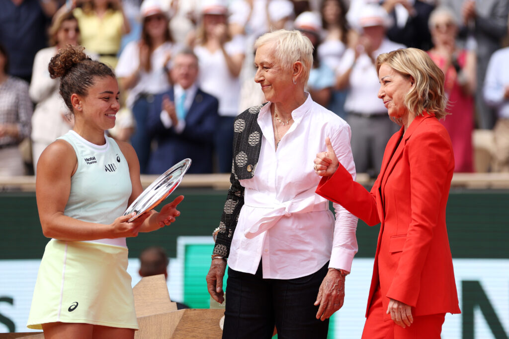 Jasmine Paolini of Italy is presented with her runners-up trophy by Martina Navratilova, Former Tennis Player, and Chris Evert, Former Tennis Player, during the trophy presentation after the Women's Singles Final match between Iga Swiatek of Poland and Jasmine Paolini of Italy on Day 14 of the 2024 French Open at Roland Garros on June 08, 2024 in Paris, France.