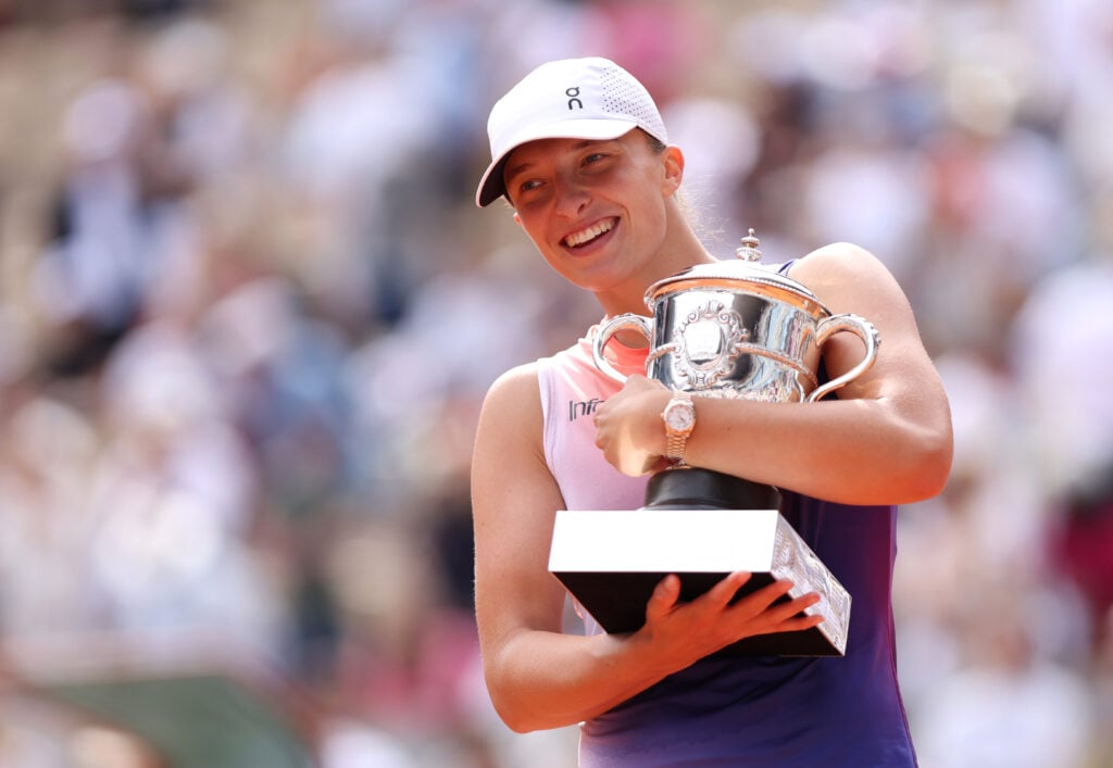 Iga Swiatek celebrates after winning the 2024 French Open