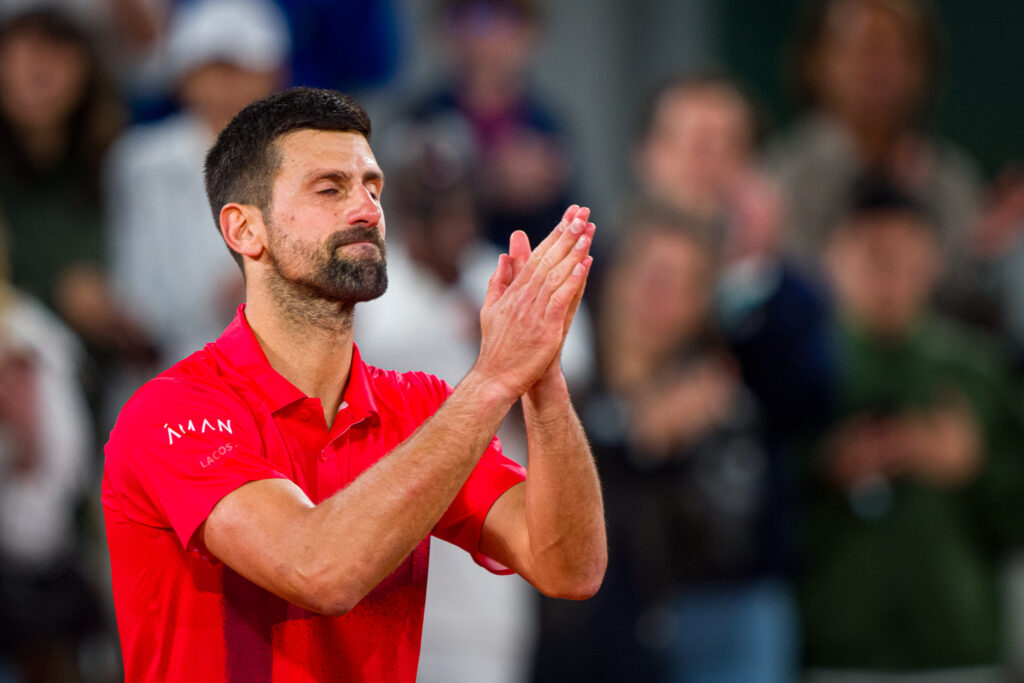 Novak Djokovic acknowledges the crowd at the 2025 French Open