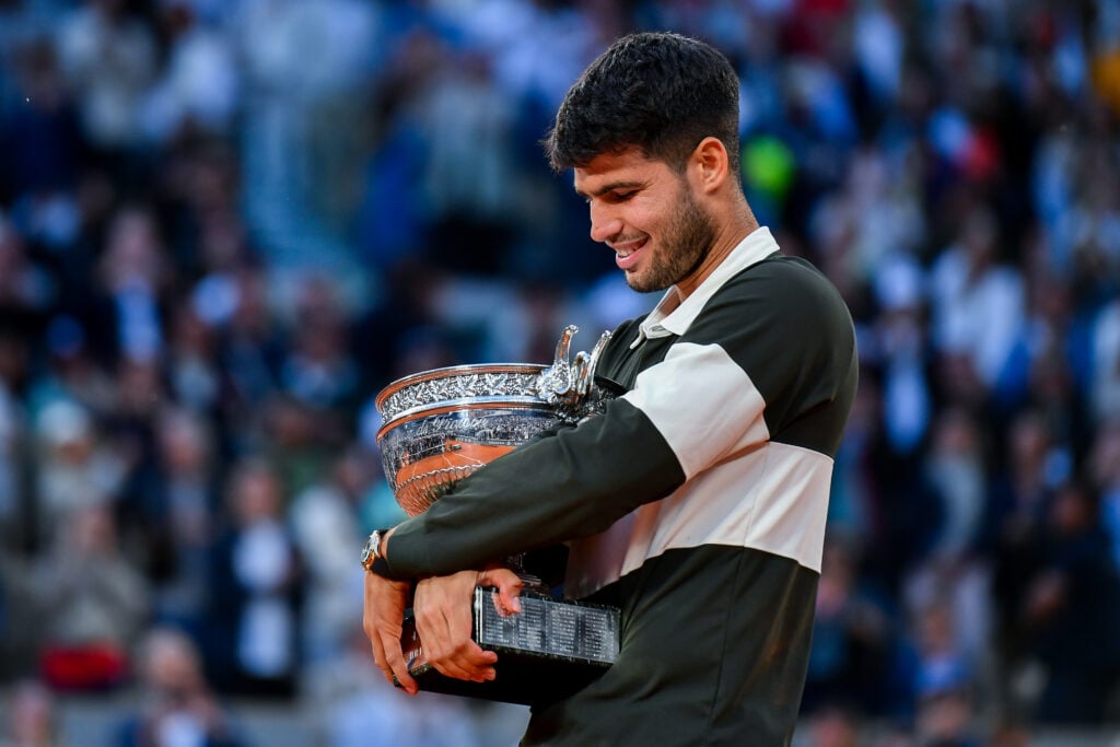 Carlos Alcaraz celebrates after winning the 2025 French Open