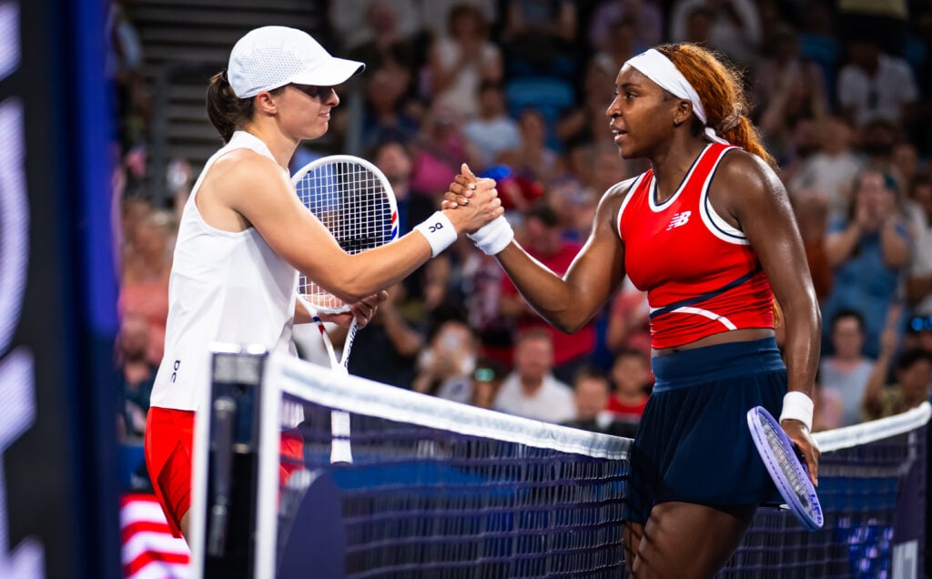 Coco Gauff and Iga Swiatek embrace after their match at the 2026 United Cup