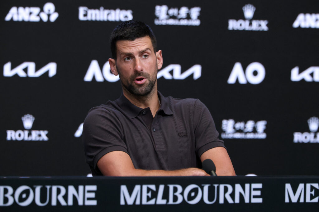 Novak Djokovic attends a press conference in Australia