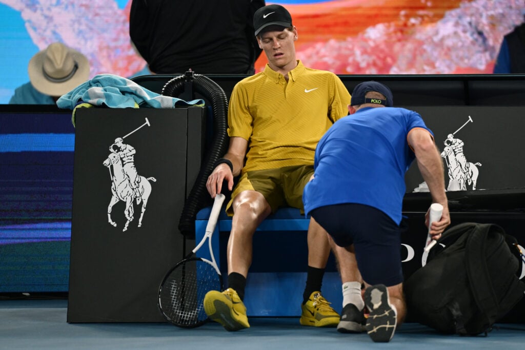 Jannik Sinner receives medical treatment during the 2026 Australian Open