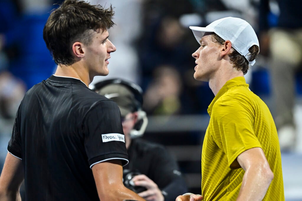 Jakub Mensik and Jannik Sinner embrace at the 2026 Qatar Open