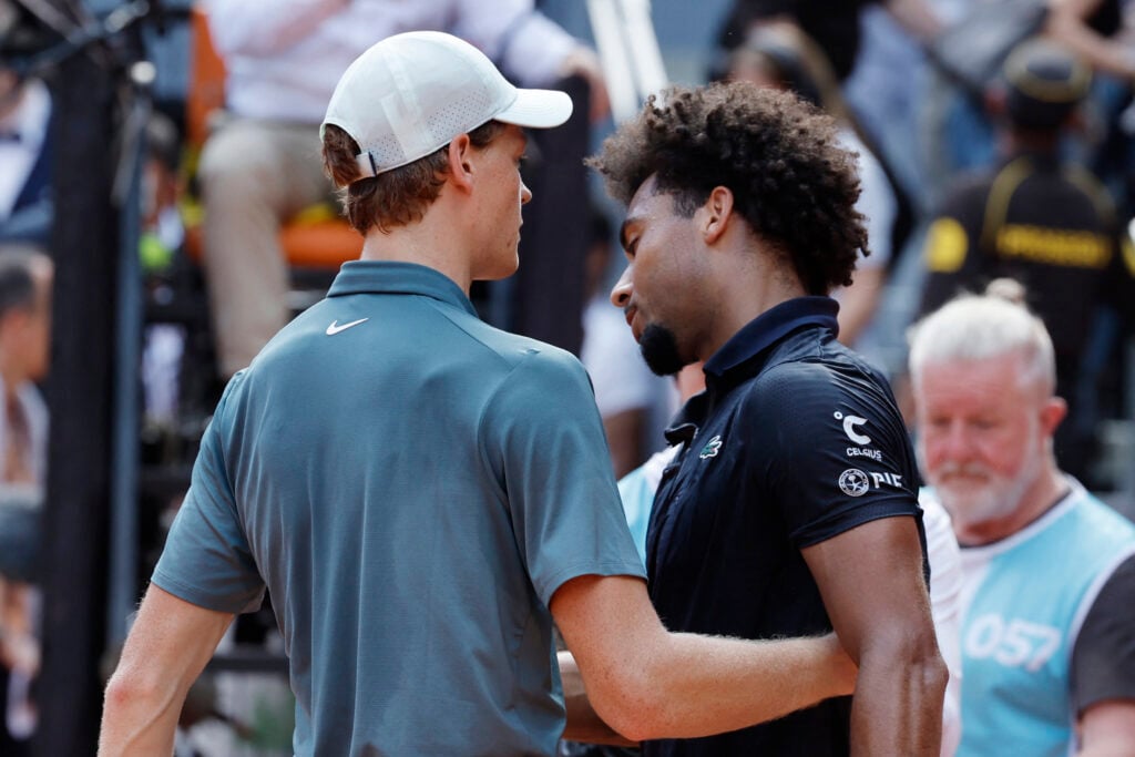 Jannik Sinner and Arthur Fils embrace after their Madrid Open semi-final