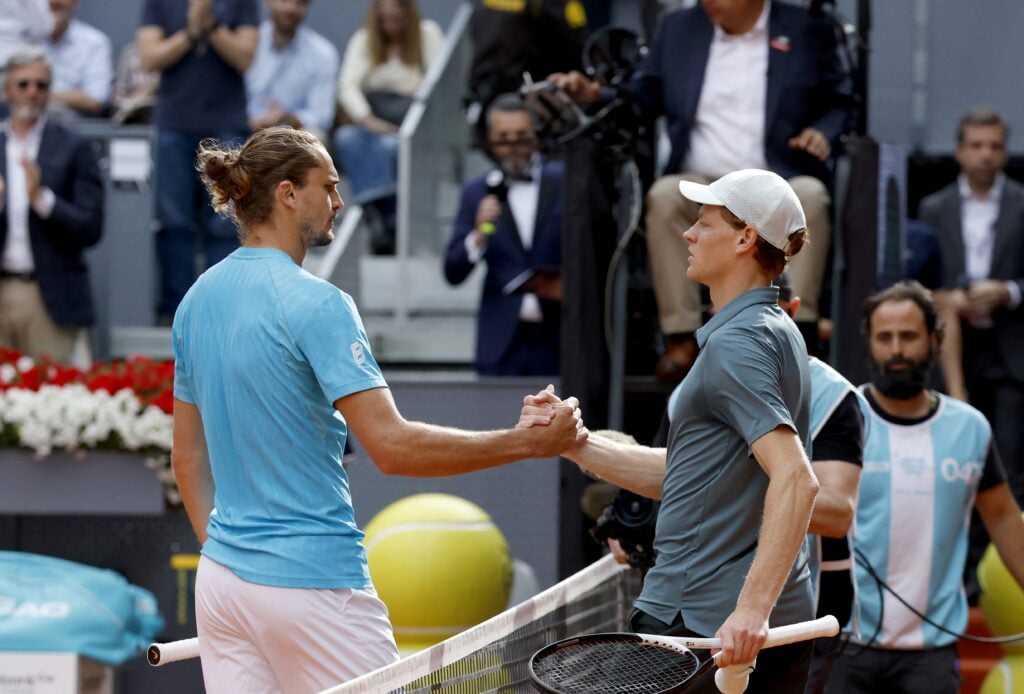 Italy's Jannik Sinner shakes hands with Germany's Alexander Zverev after winning their 2026 ATP Tour Madrid Open tennis tournament final singles match at the Caja Magica in Madrid, on May 3, 2026.