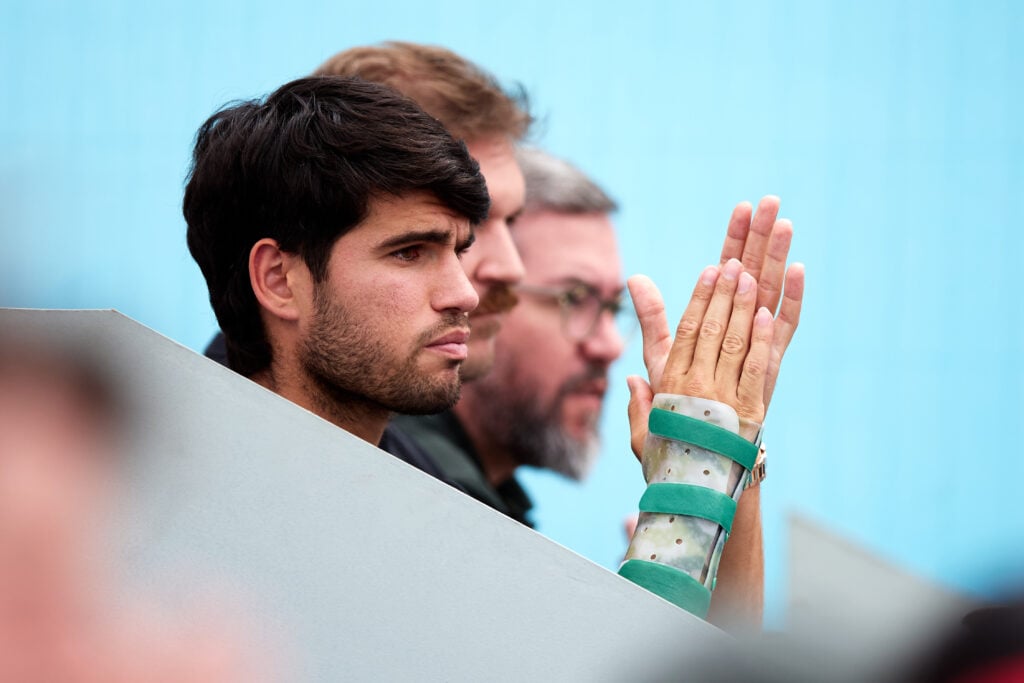 Carlos Alcaraz of Spain applauds from the stands while watching his brother Jaime Alcaraz compete during the Mutua Madrid Open Sub-16 on April 30, 2026 in Madrid, Spain.