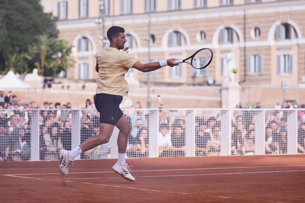 Novak Djokovic hits a forehand