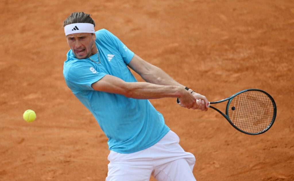 Alexander Zverev hits a backhand against Luciano Darderi