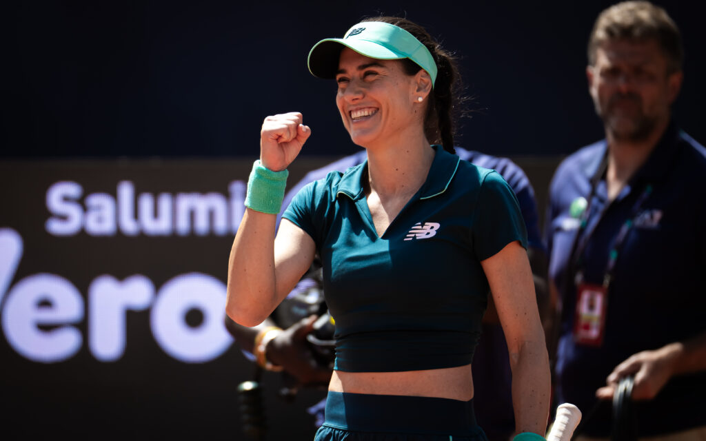 Sorana Cirstea celebrates after beating Jelena Ostapenko in Rome