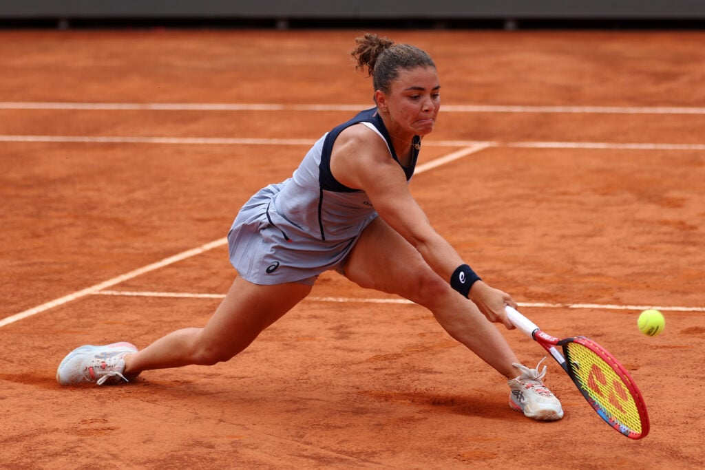 Jasmine Paolini of Italy plays a forehand against Elise Mertens of Belgium in their Round of 32 match during day Five of the Internazionali BNL D'Italia 2026 at Foro Italico on May 09, 2026 in Rome, Italy.