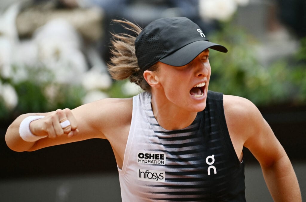 Poland's Iga Swiatek celebrates after winning against USA's Jessica Pegula during the ATP Rome Open tennis tournament at Foro Italico in Rome on May 13, 2026.