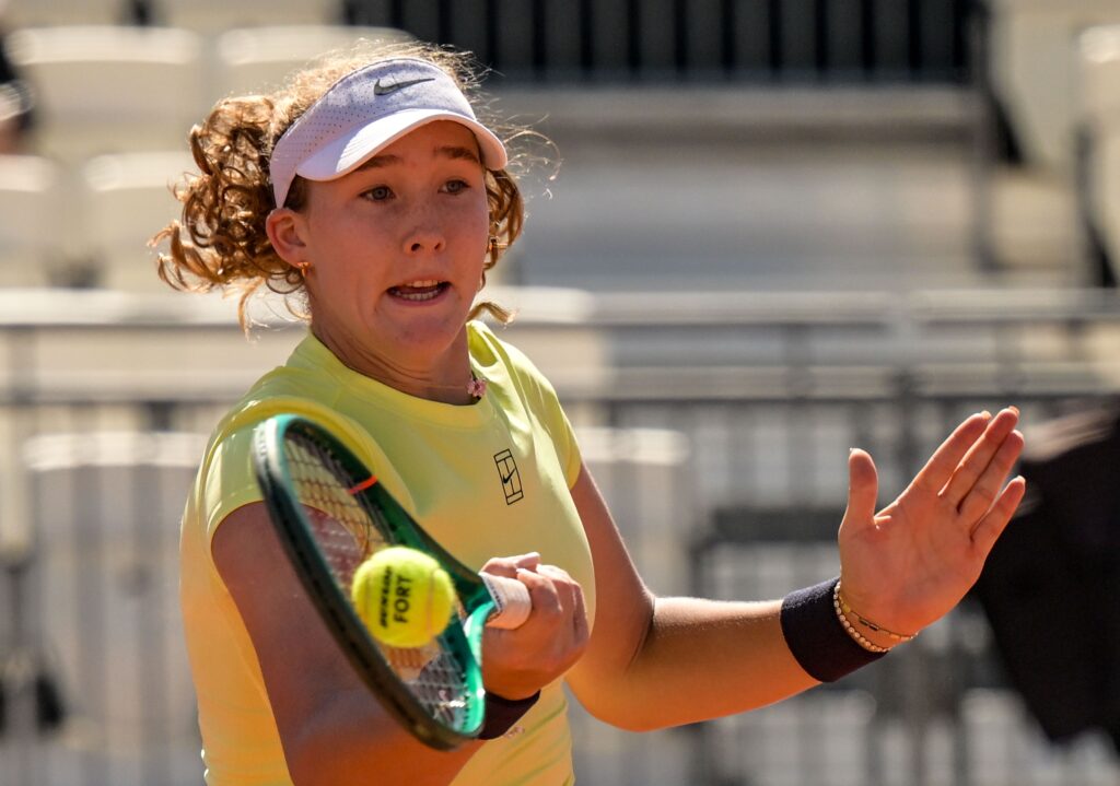 Mirra Andreeva plays a forehand against Elise Mertens of Belgium in the fourth round on Day Seven of the Internazionali BNL D'Italia at Foro Italico on May 11, 2026 in Rome, Italy