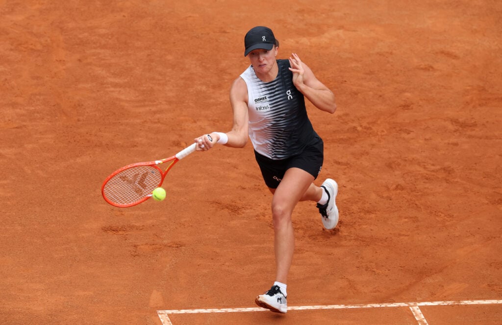 Iga Swiatek of Poland plays a forehand against Jessica Pegula of United States in the Women's Singles Quarterfinal match on day nine of the Internazionali BNL D'Italia at Foro Italico on May 13, 2026 in Rome, Italy.