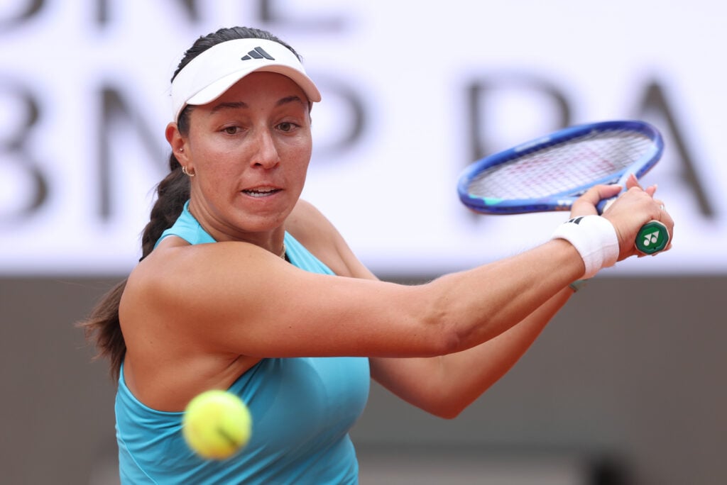 Jessica Pegula of United States plays a backhand against Iga Swiatek of Poland in the Women's Singles Quarterfinal match on day nine of the Internazionali BNL D'Italia at Foro Italico on May 13, 2026 in Rome, Italy.