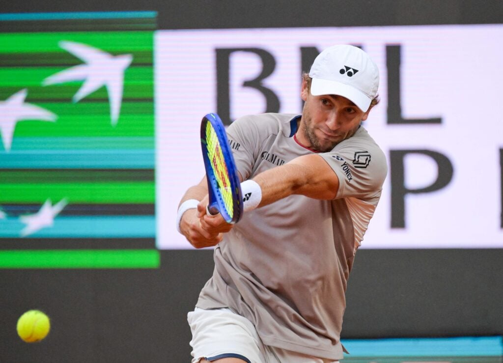 Casper Ruud hits a backhand against Karen Khachanov at the 2026 Italian Open.