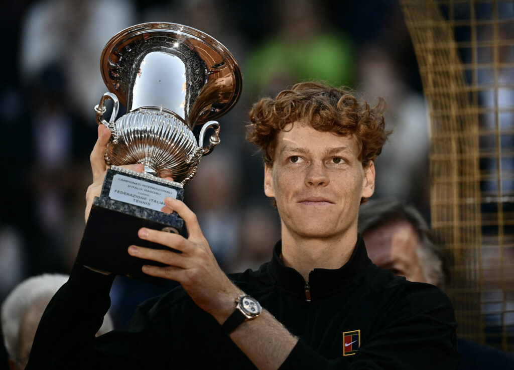 Jannik Sinner celebrates after winning the Italian Open.