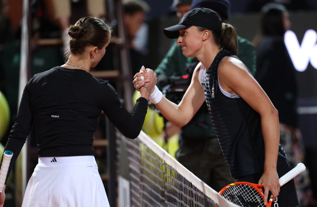 Elina Svitolina shakes Iga Swiatek's hand after beating her at the 2026 Italian Open.