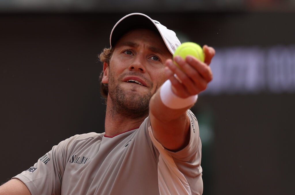 Casper Ruud serves against Luciano Darderi at the 2026 Italian Open