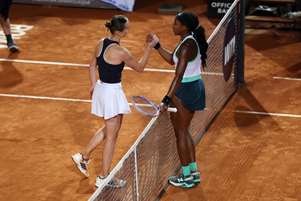 Elina Svitolina and Coco Gauff shake hands