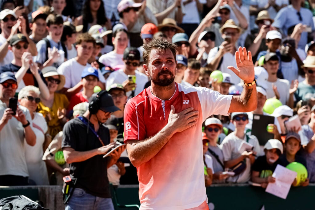 Stan Wawrinka of Switzerland shows his appreciation to the crowd, having announced his retirement, following defeat by Jesper De Jong of Netherlands during men's singles on Day Two of the 2026 French Open at Roland Garros on May 25, 2026 in Paris, France.