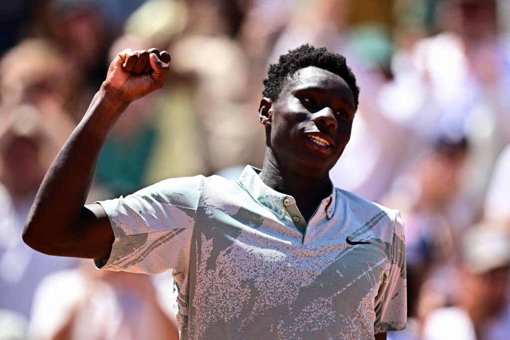 France's Moise Kouame celebrates his victory over Croatia's Marin Cilic during their men's singles match on day 3 of the French Open tennis tournament on Court Simonne-Mathieu at the Roland-Garros Complex in Paris on May 26, 2026.
