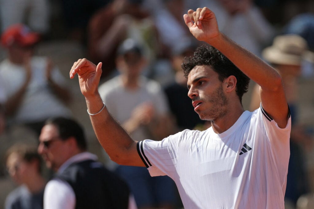 Francisco Cerundolo celebrates after winning his second-round match at Roland Garros