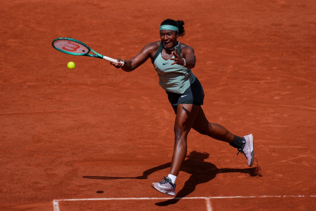 Hailey Baptiste hits a forehand against Barbora Krejcikova at Roland Garros in 2026.