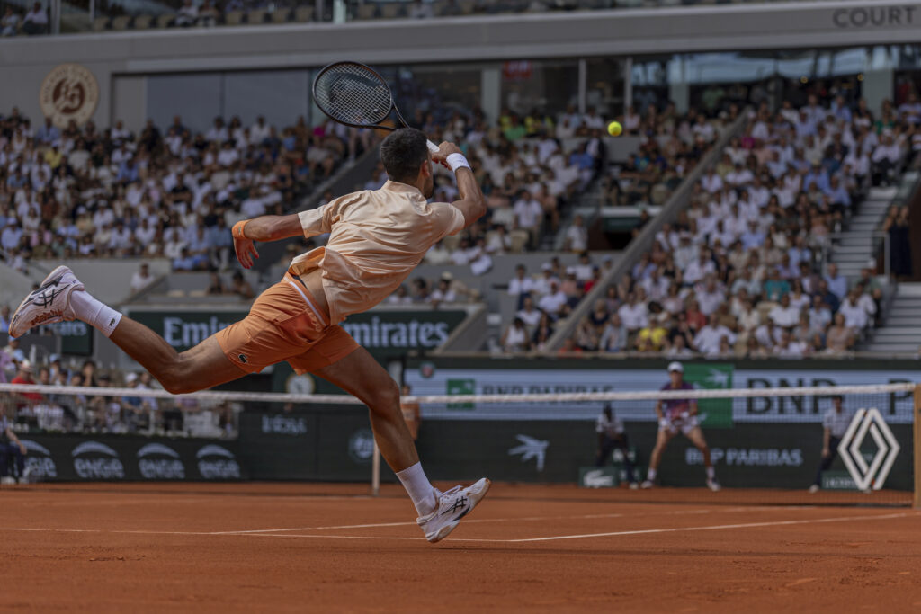 Novak Djokovic returns a shot during the 2026 French Open.