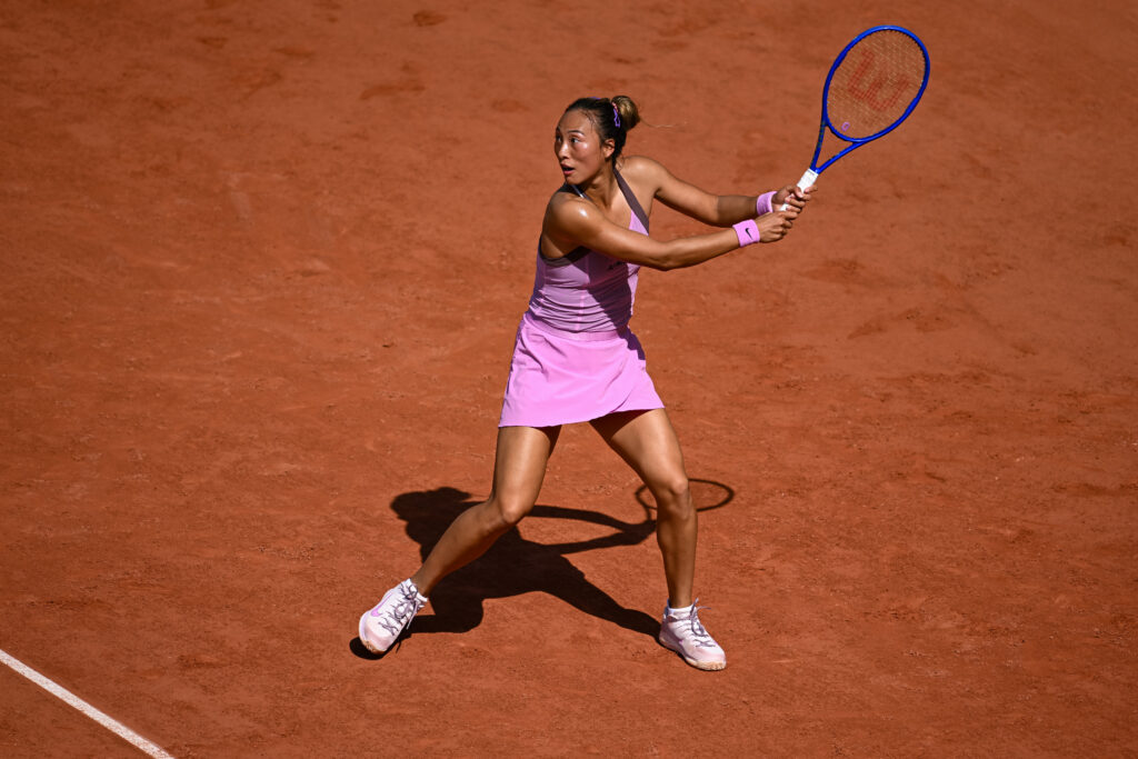 Qinwen Zheng hits a backhand