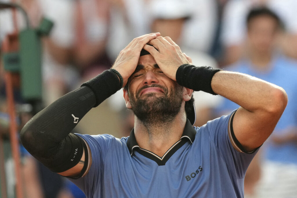 Matteo Berrettini celebrates after beating Francisco Comesana at the 2026 French Open