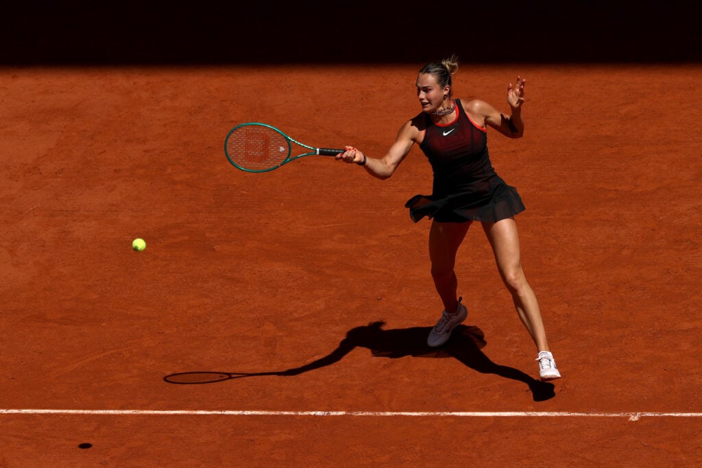 Aryna Sabalenka plays a forehand against Jessica Bouzas Maneiro of Spain during the Women's Singles first round match during Day Three of the 2026 French Open at Roland Garros on May 26, 2026 in Paris, France.