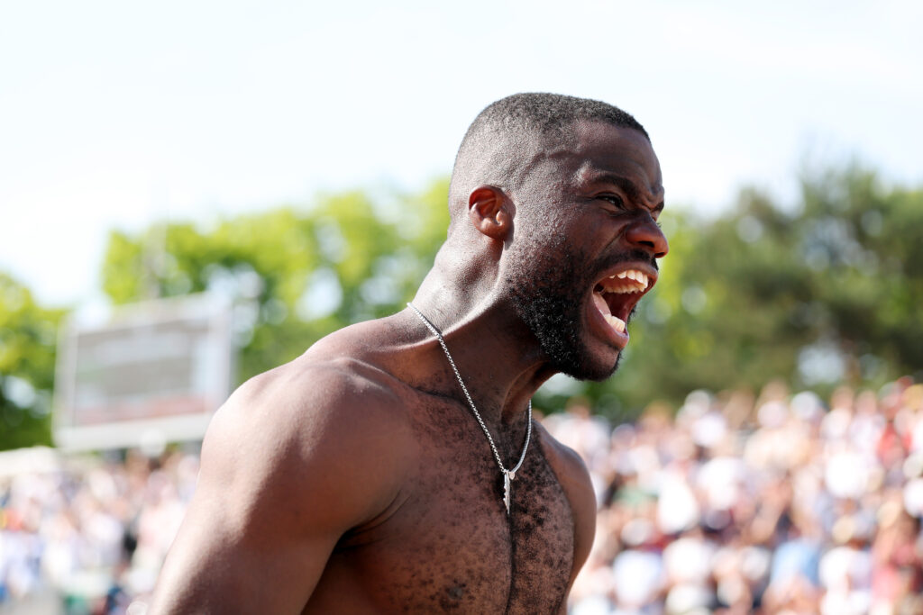 Frances Tiafoe celebrates, shouting