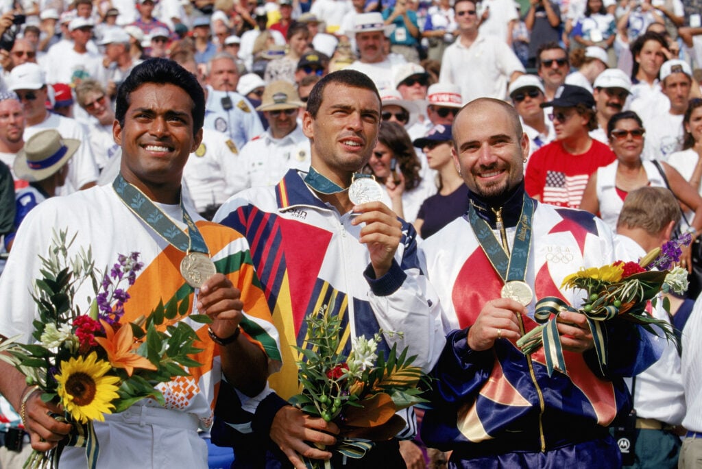 Andre Agassi celebrates after winning Olympic gold
