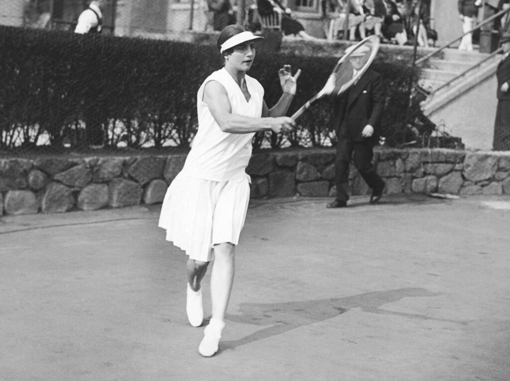 Helen Wills Moody begins a two week practice session at the West Side Tennis Club on Long Island before sailing to Europe to defend her Wimbledon and French titles, Forest Hills, New York, 1930.