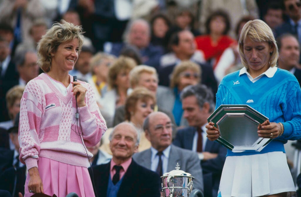 American tennis players Chris Evert (left) and Martina Navratilova with the trophies after Evert beat Navratilova to win the Women's Singles at the French Open, Stade Roland Garros, Paris, 7th June 1986. Evert won the match 2-6, 6-3, 6-3.