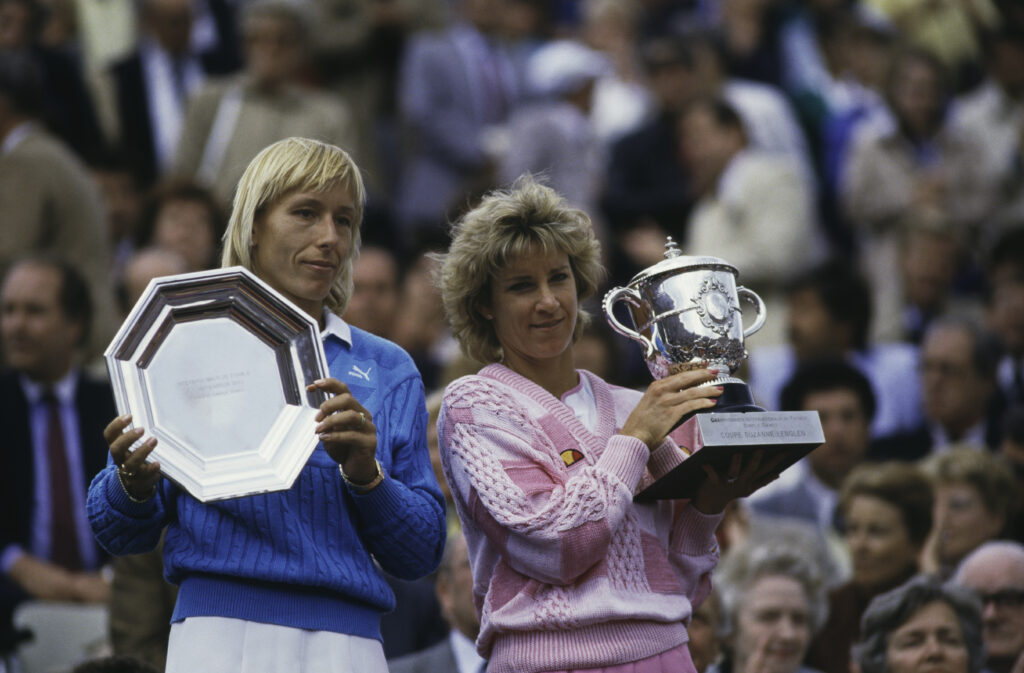 American tennis players Martina Navratilova (left) and Chris Evert-Lloyd with the trophies, after Evert beat Navratilova to win the Women's Singles title at the French Open, Stade Roland Garros, Paris, 7th June 1986. Evert won the match 2-6, 6-3, 6-3.
