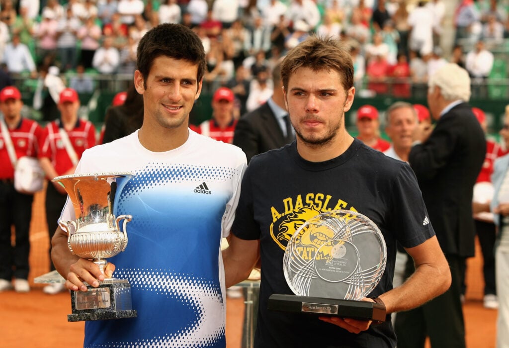 Novak Djokovic of Serbia holds the Italian Open trophy with Stanislas Wawrinka of Switzerland after his three set victory during the mens final at the ATP Masters Series at the Foro Italico, on May 11, 2008 in Rome, Italy.