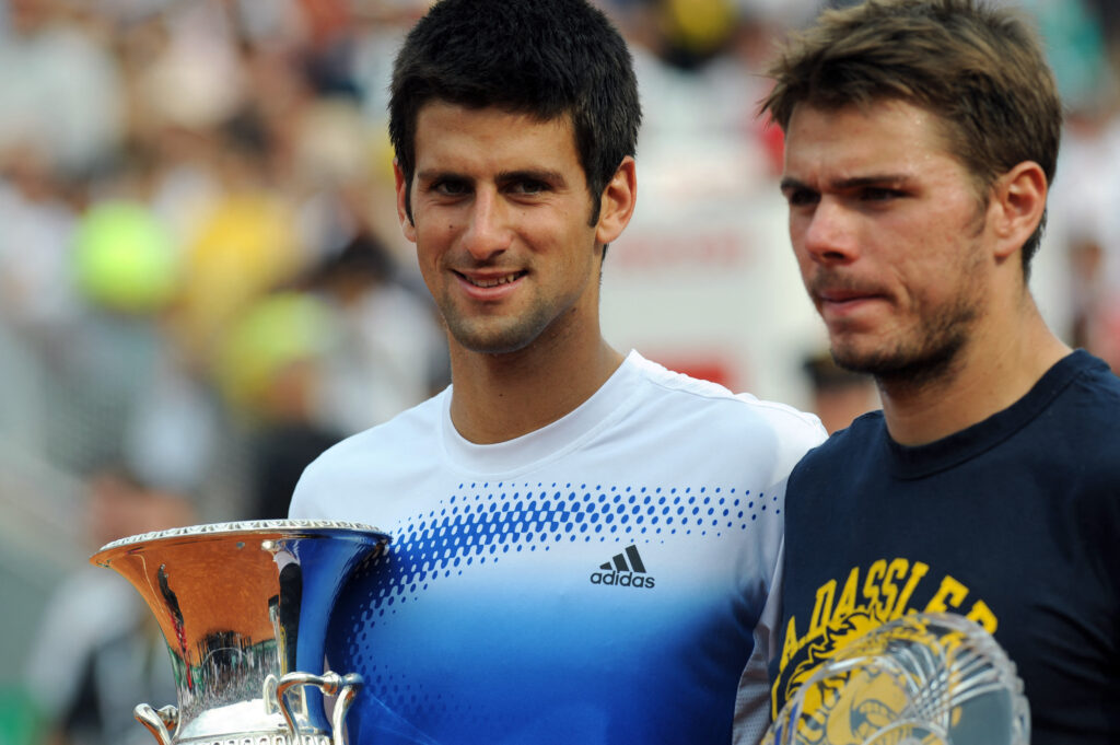 Third seed Serbian Novak Djokovic (L) poses at the end of the final of the ATP Tennis Open in Rome on May 11, 2008 against Switzerland's Stanislas Wawrinka (R). Djokovic claimed a 4-6, 6-3, 6-3 win over his Swiss opponent, who ended the most remarkable week of his career with a breakout performance that will take him up among the top ten when the ATP rankings.