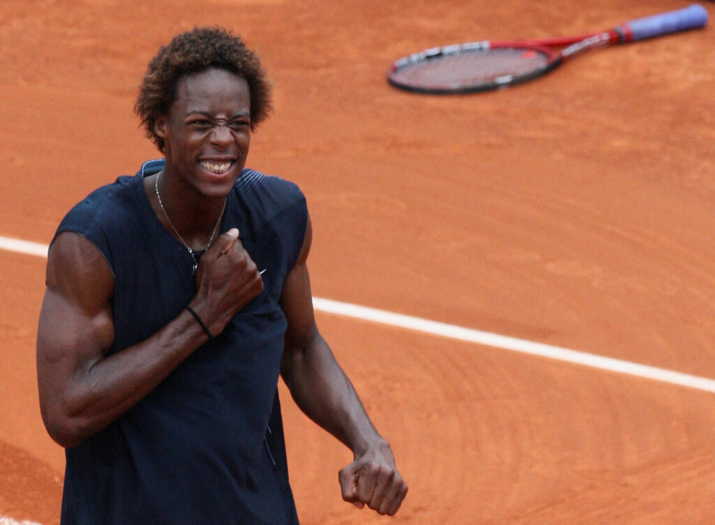 French player Gael Monfils celebrates after winning against Spanish player David Ferrer during their French tennis Open quarter final match at Roland Garros, on June 04, 2008 in Paris. Monfils won 6-3, 3-6, 6-3, 6-1.