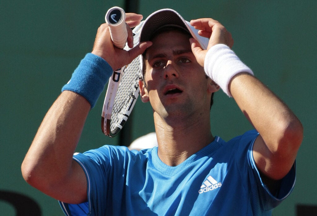 Serbian player Novak Djokovic reacts to play against German player Philipp Kohlschreiber in a French Open tennis third round match on May 30, 2009 at Roland Garros Stadium in Paris. The event, the second Grand Slam tournament of 2009, runs from May 25 to June 7, 2009. Kohlschreiber won 6/4,6/4,6/4.