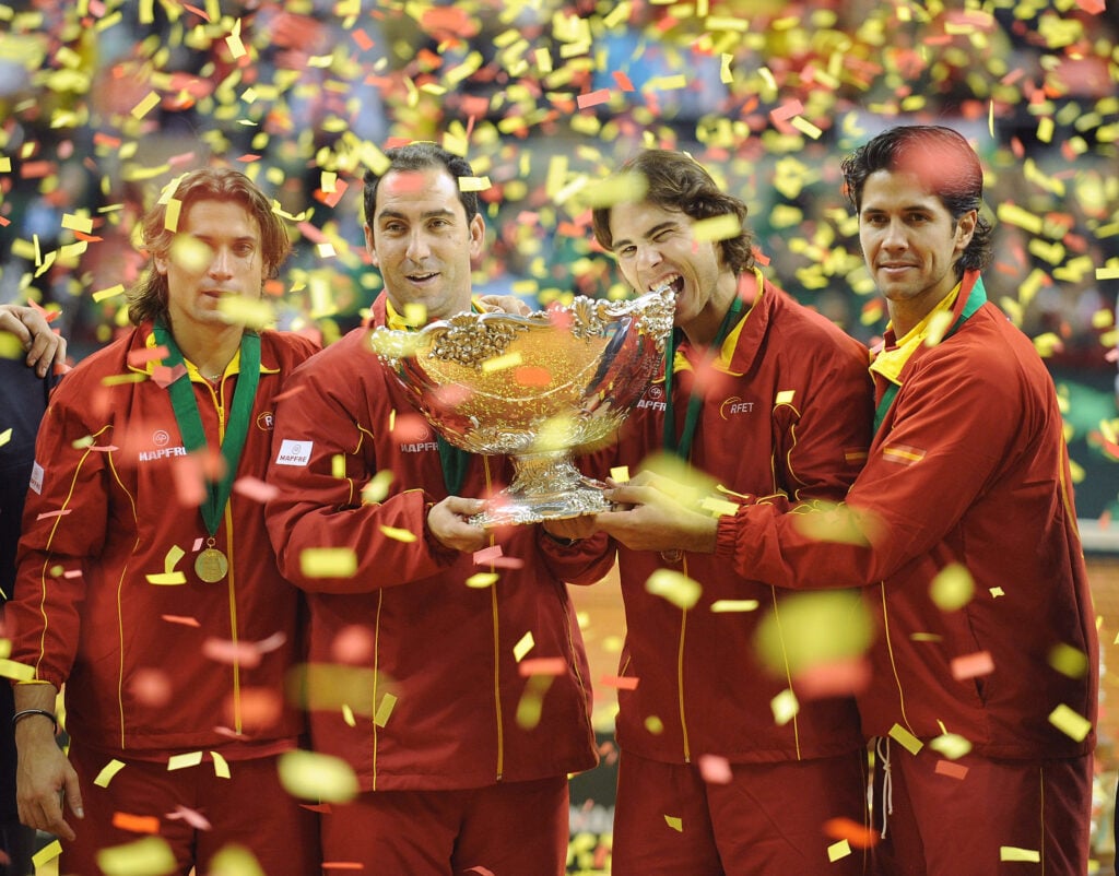 Spanish players David Ferrer (L), team captain Albert Costa (C) Rafael Nadal and Fernando Verdasco celebrate with the Davis Cup trophy at the end of the final match between Spain and Czech Republic at the Palau Sant Jordi stadium on December 6, 2009 in Barcelona, Spain.