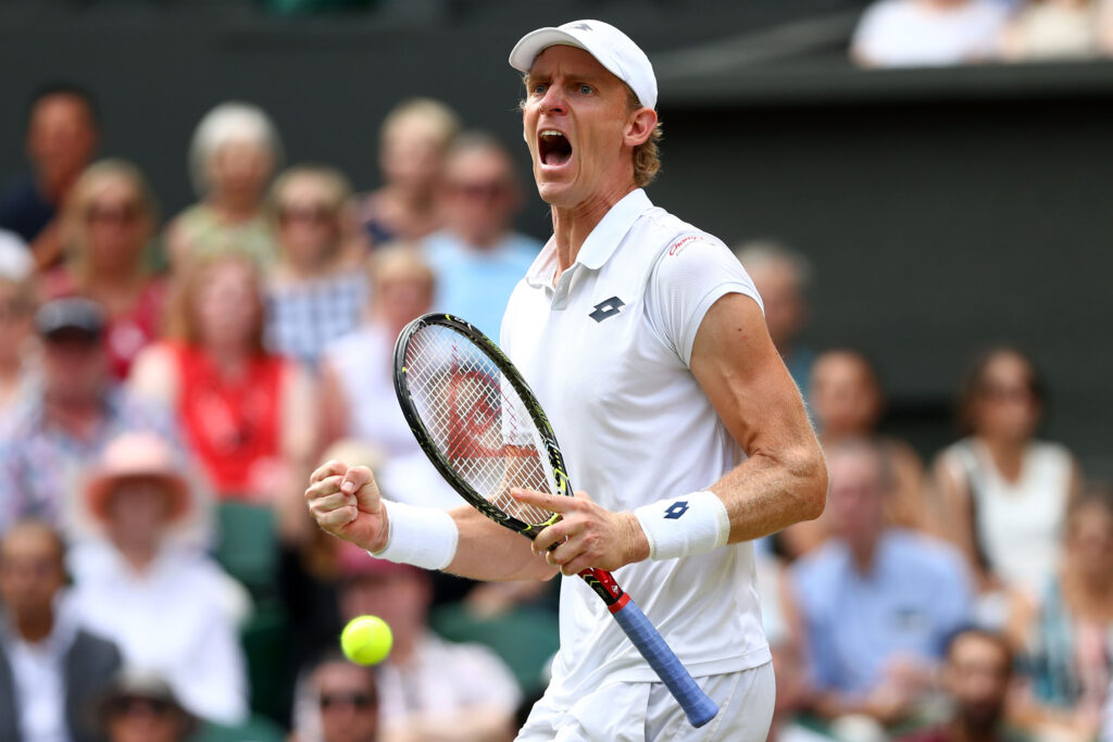 Kevin Anderson of South Africa celebrates winning a break point against John Isner of The United States during their Men's Singles semi-final match on day eleven of the Wimbledon Lawn Tennis Championships at All England Lawn Tennis and Croquet Club on July 13, 2018 in London, England.