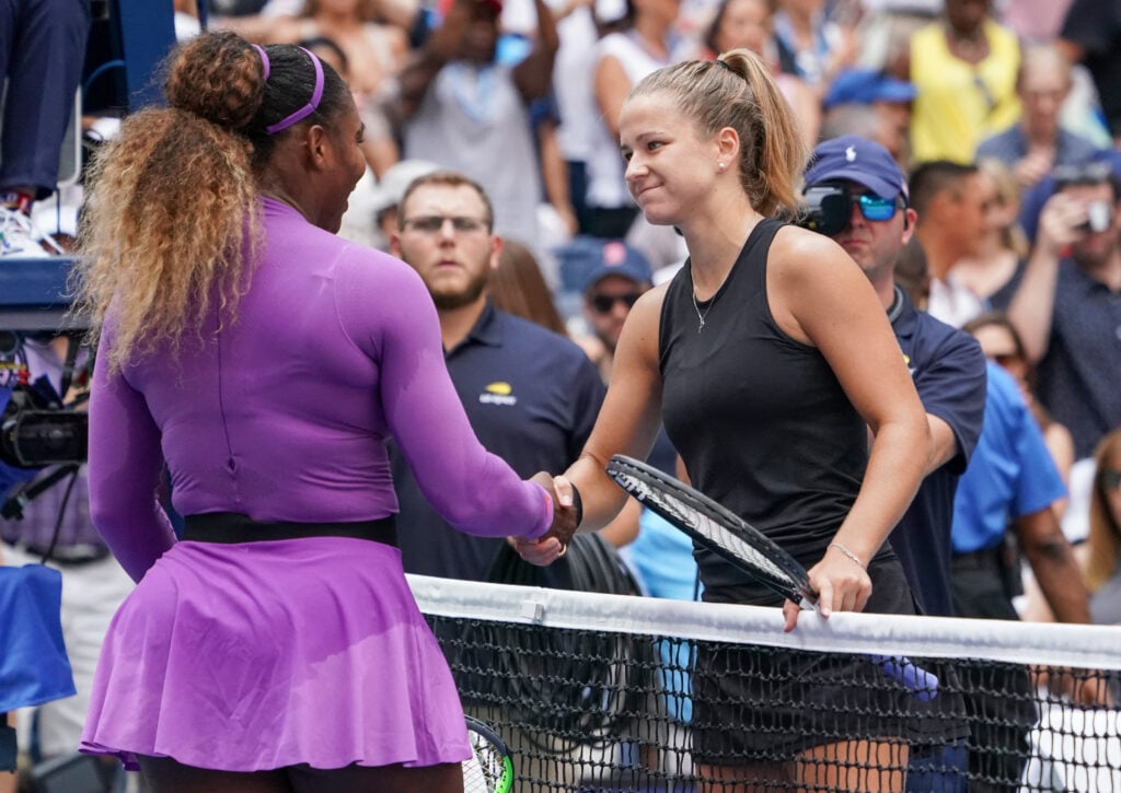 Serena Williams and Karolina Muchova shake hands at the 2019 US Open.