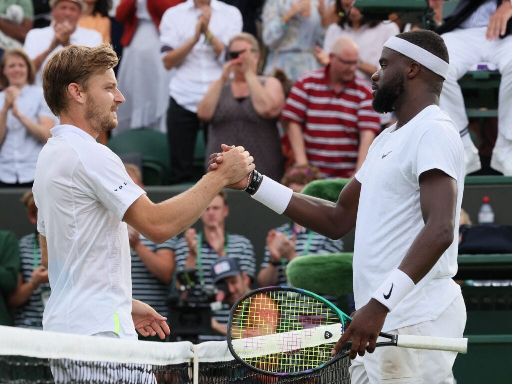 Belgian David Goffin and American Frances Tiafoe pictured after a tennis match between Belgian Goffin and US Tiafoe in the fourth round of the men's singles tournament at the 2022 Wimbledon grand slam tennis tournament at the All England Tennis Club, in south-west London, Britain, Sunday 03 July 2022.