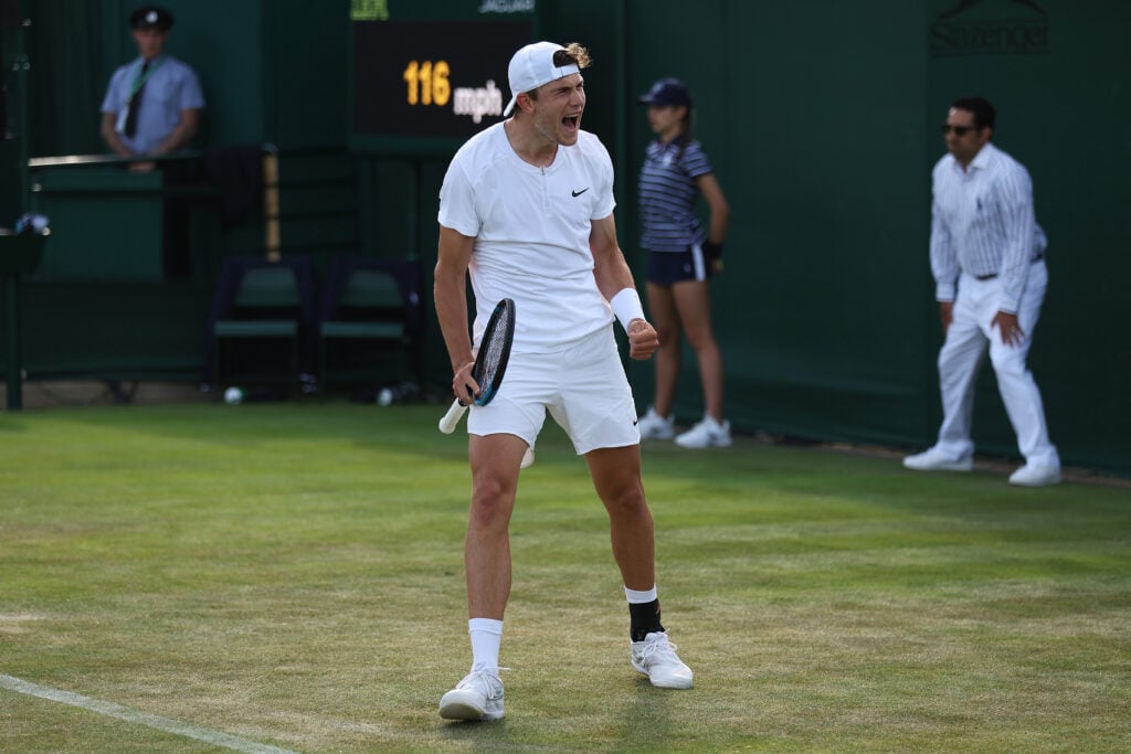 Jack Draper of Great Britain celebrates winning match point in their Men's Singles First Round Match against Zizou Bergs of Belgium on day two of The Championships Wimbledon 2022 at All England Lawn Tennis and Croquet Club on June 28, 2022 in London, England.