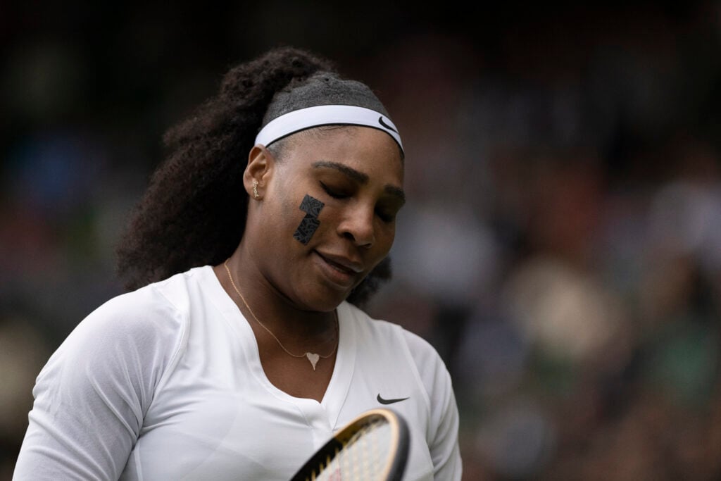 Serena Williams looks on during her defeat at the 2022 Wimbledon Championships.