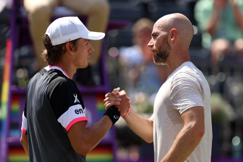 Alex De Minaur of Australia shakes hands with Adrian Mannarino of France after the Men's Singles Quarter Final match on Day Five of the cinch Championships at The Queen's Club on June 23, 2023 in London, England.